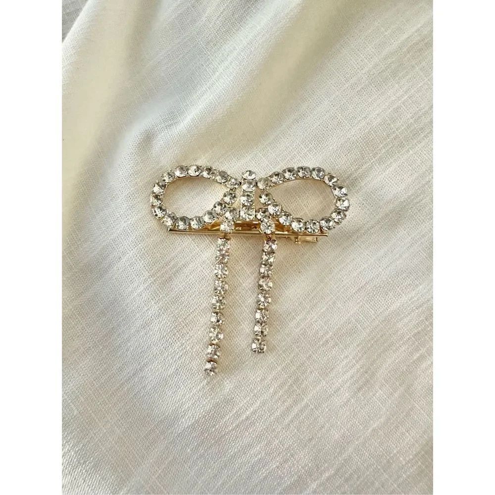 Rhinestone embellished bow hair clip